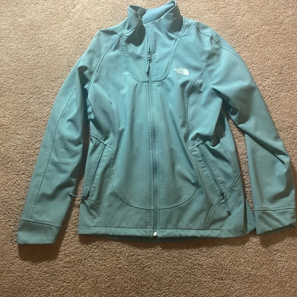The North Face women’s Windwall jacket size medium.